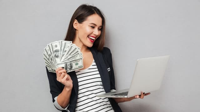 Store owner with cash